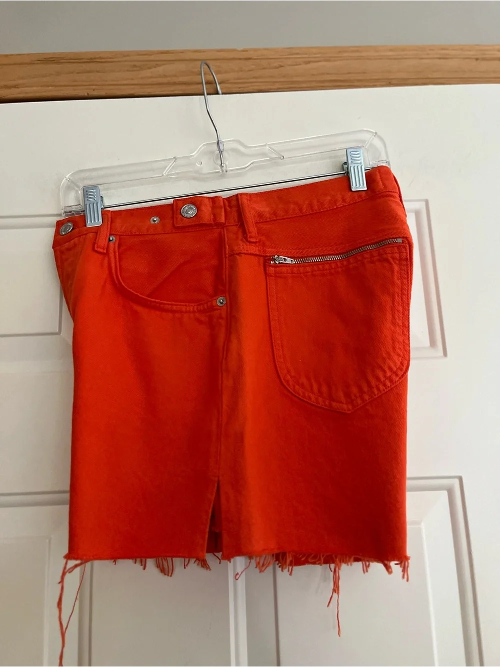 Women’s 7 for all Mankind Easy Ruby Orange raw hem button fly Jean short.Size 26